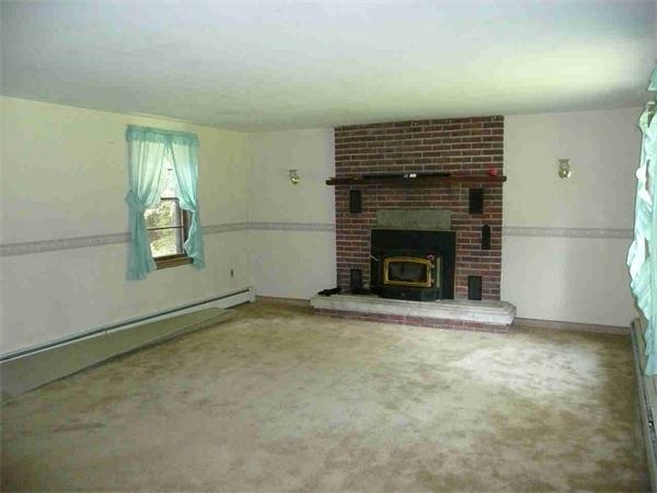 558 Leadmine Road Sturbridge, MA 01566 - Photo 9 of 15 an empty room with windows