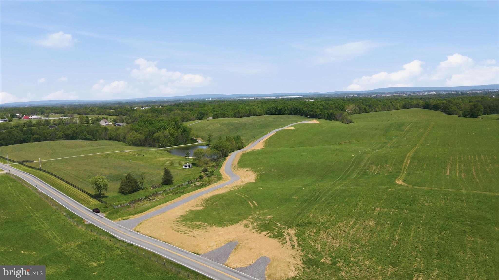 6554 Bino Road, Unit LOT 1 Greencastle, PA 17225 - Photo 2 of 11 a view of a water from a balcony