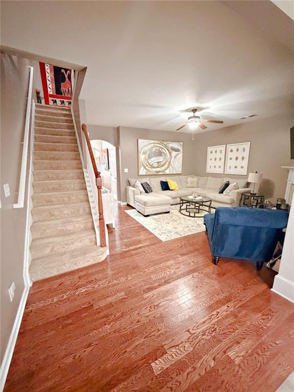 2708 Beynon Lane Northeast Suwanee, GA 30024 - Photo 14 of 38 a view of a living room and kitchen