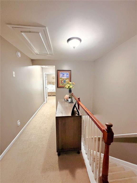 2708 Beynon Lane Northeast Suwanee, GA 30024 - Photo 21 of 38 a view of a hallway with seating area