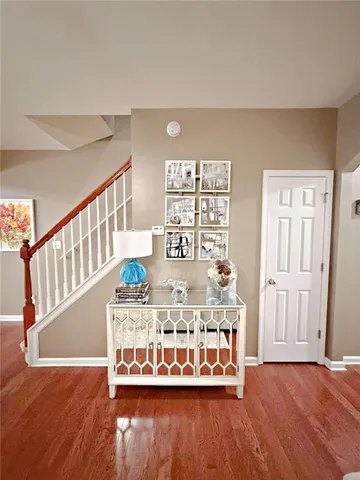 a living room with furniture with wooden floor