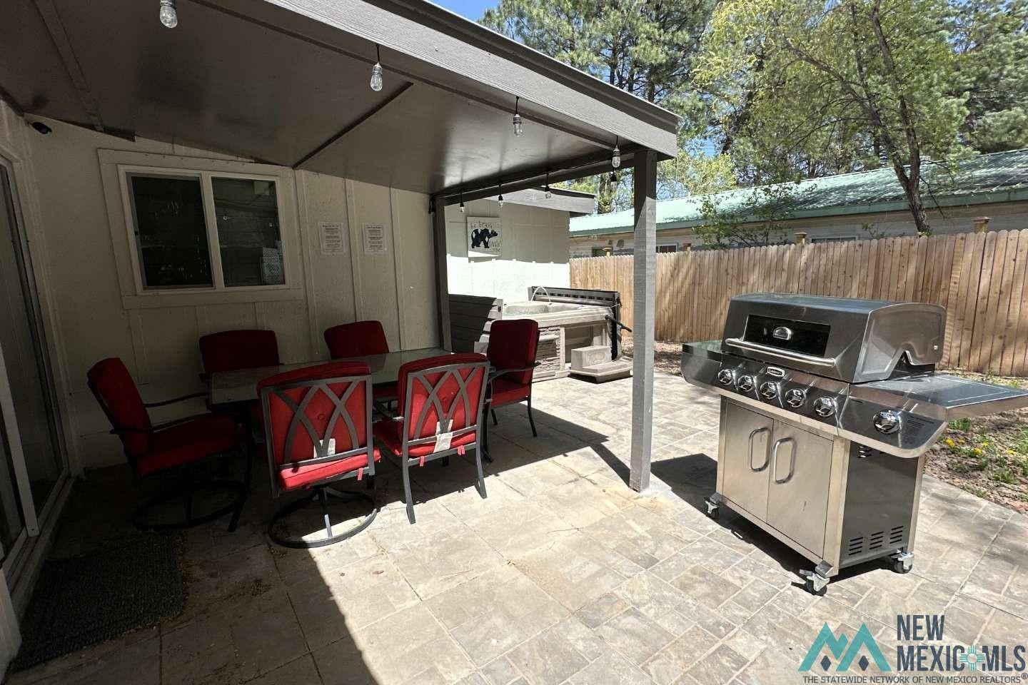 241 Junction Road Ruidoso, NM 88345 - Photo 34 of 44 View of patio with area for grilling and outdoor dining area