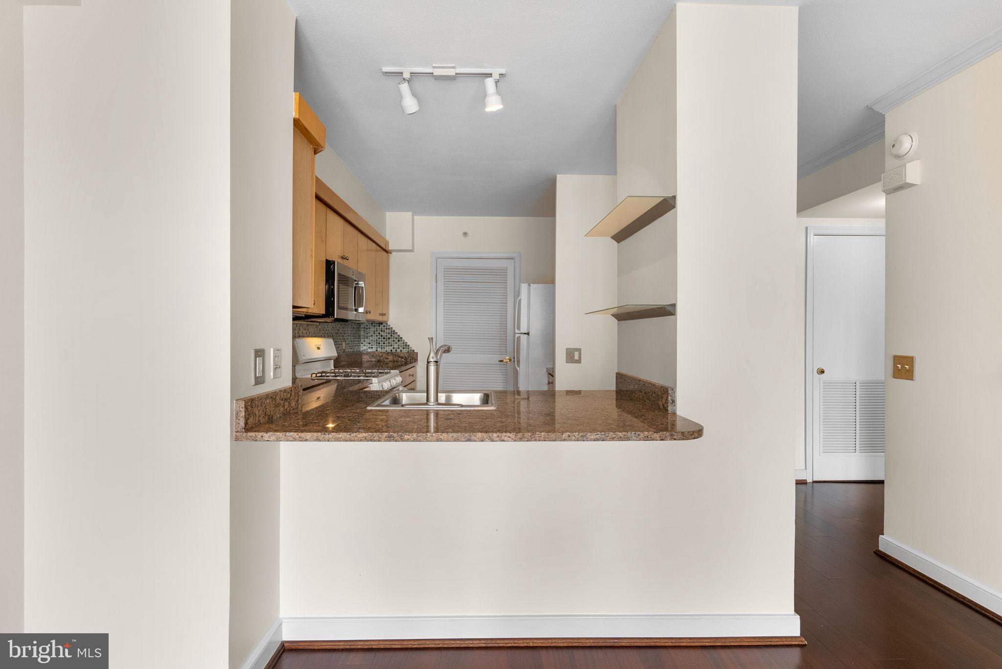 631 D Street Northwest, Unit 1129 Washington, DC 20004 - Photo 14 of 29 a close view of sink and tap