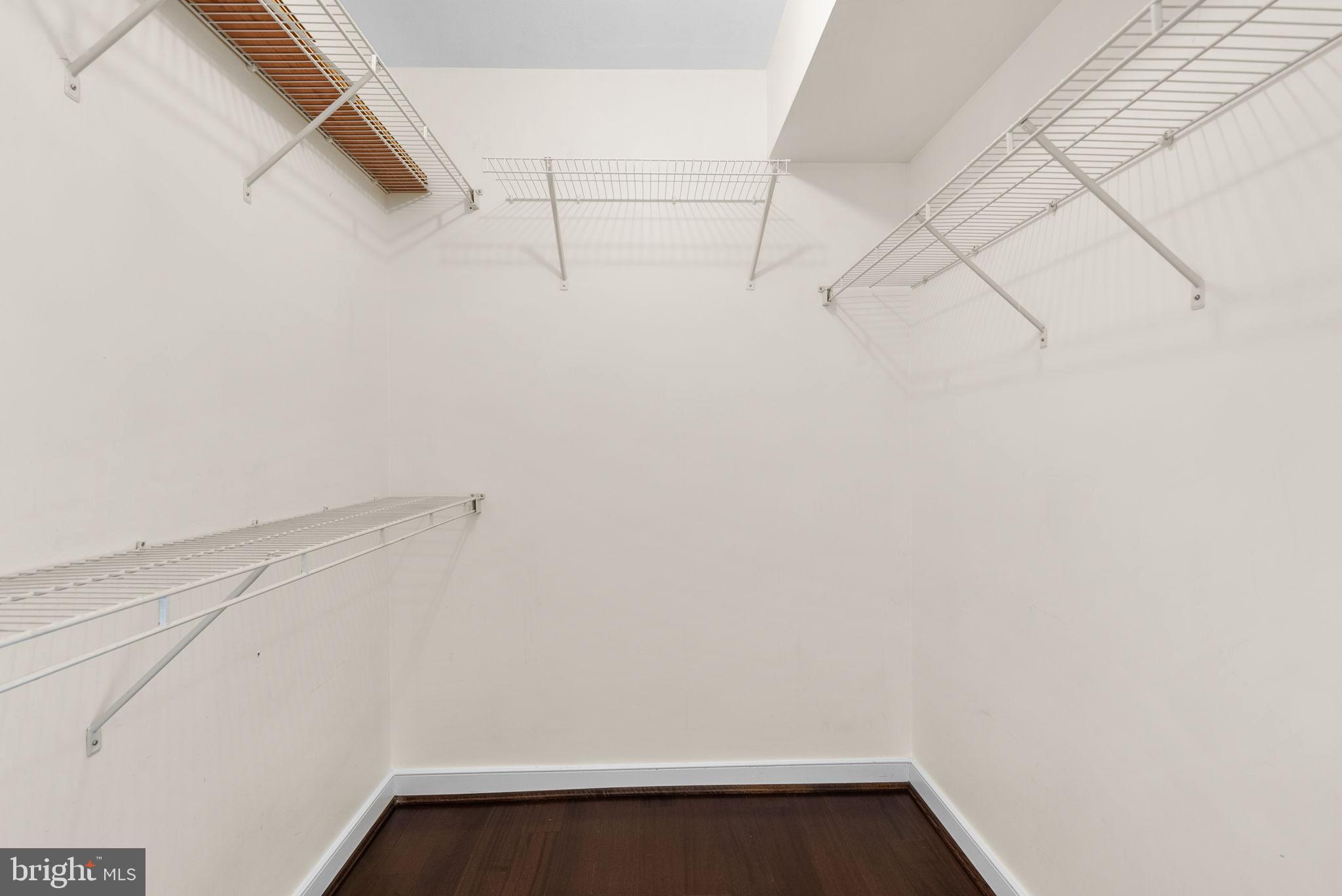 631 D Street Northwest, Unit 1129 Washington, DC 20004 - Photo 24 of 29 a view of small space with racks on the wall