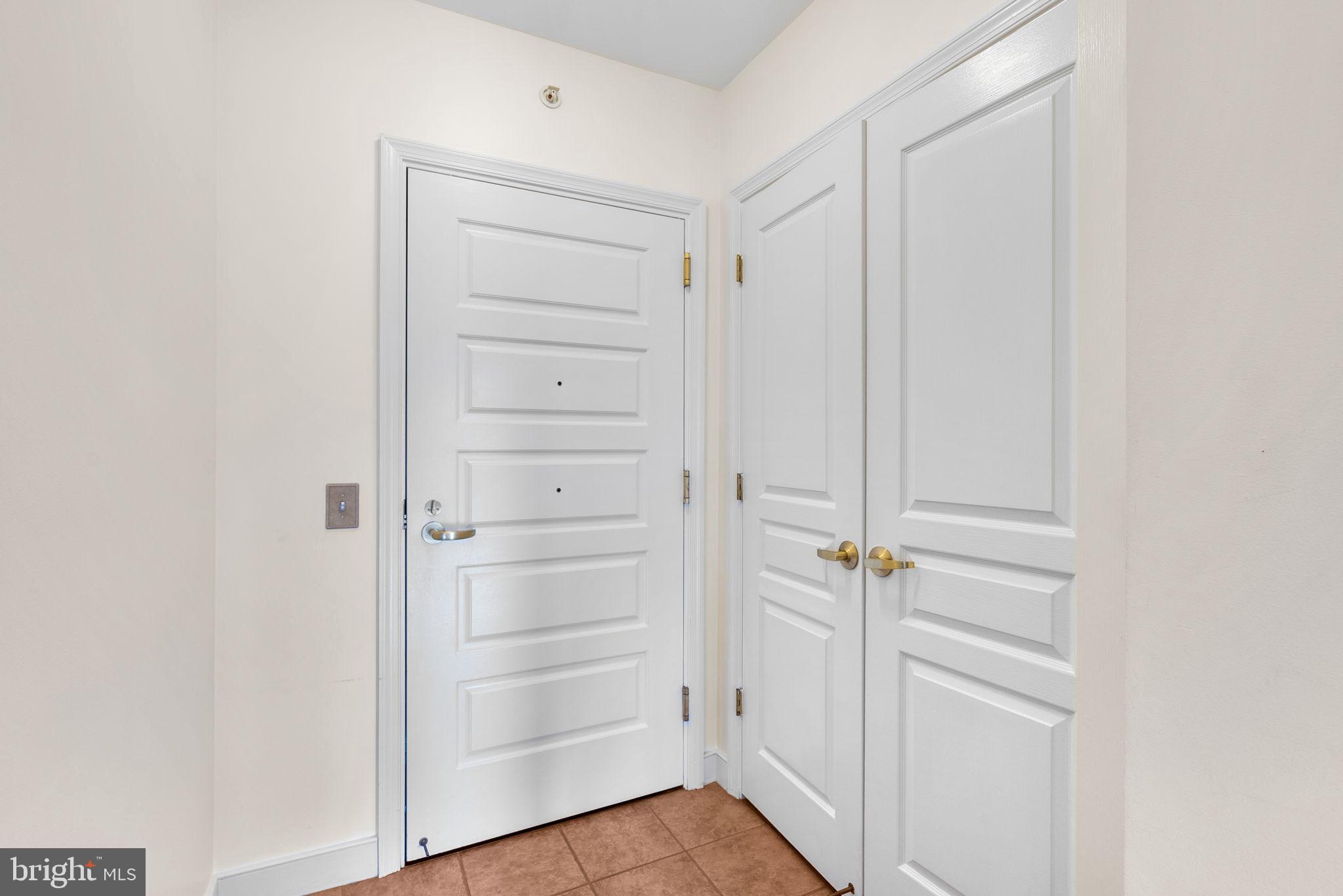 631 D Street Northwest, Unit 1129 Washington, DC 20004 - Photo 9 of 29 a view of walk in closet with empty racks
