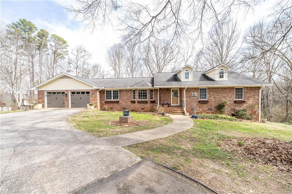 297 Canard Road Southeast Rome, GA 30161 - Photo 1 of 1 a front view of a house with a yard and porch