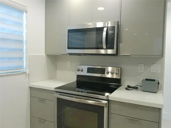 a utility room with washer and dryer
