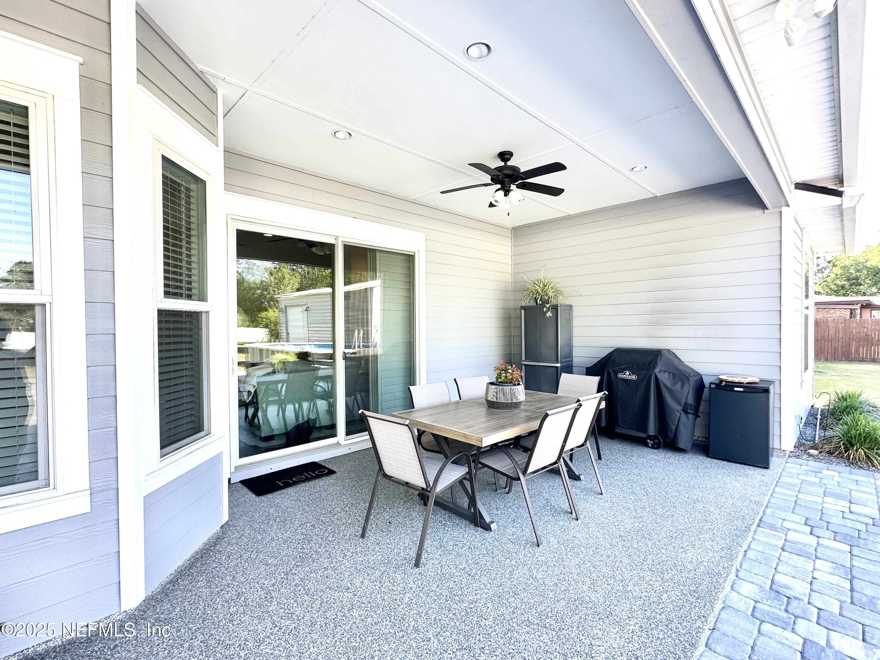 55370 Deer Run Road Callahan, FL 32011 - Photo 27 of 44 a dining room with furniture and window