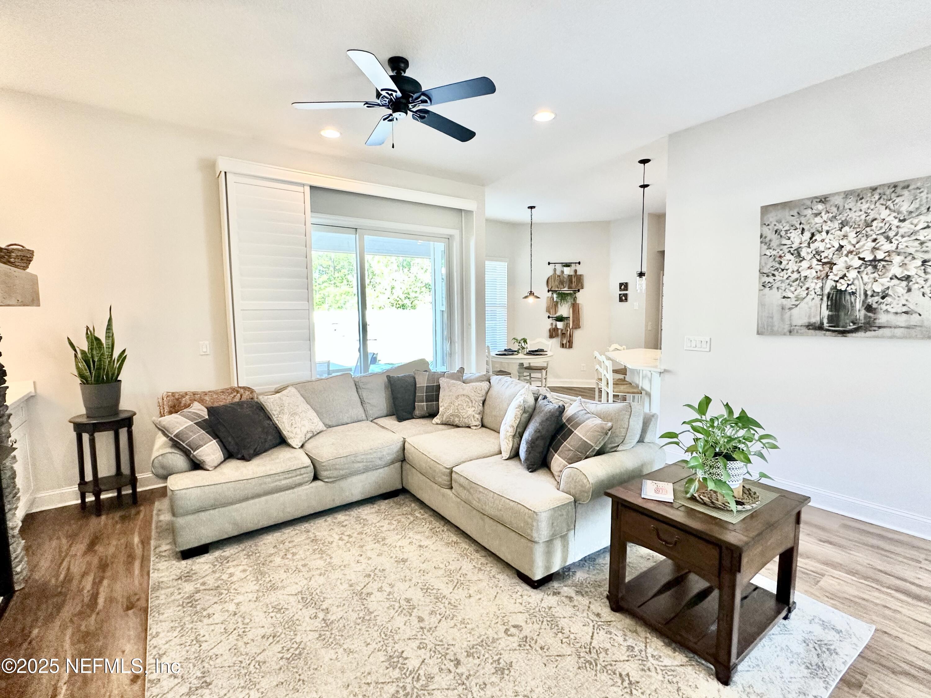 55370 Deer Run Road Callahan, FL 32011 - Photo 9 of 44 a living room with furniture and a large window