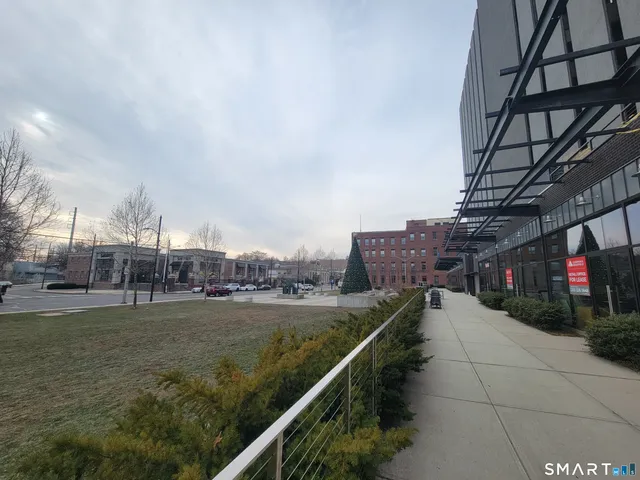 a view of a city with tall buildings in background