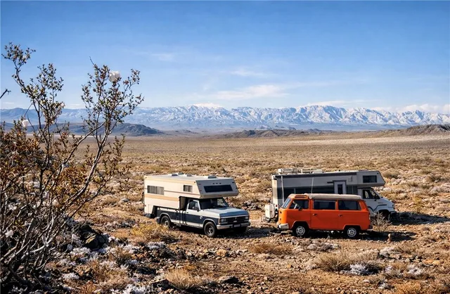 an aerial view of a house with a ocean view