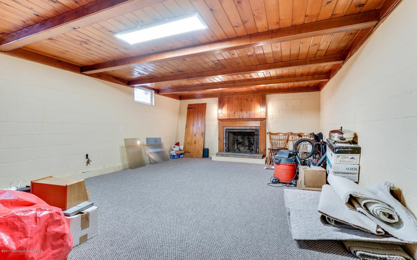 152 Wemrock Road Freehold, NJ 07728 - Photo 19 of 22 Partially Finished Basement w/Fireplace