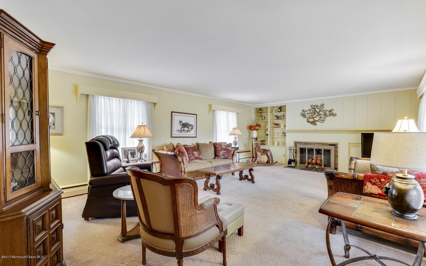 152 Wemrock Road Freehold, NJ 07728 - Photo 5 of 22 Living Room with Built In Shelves