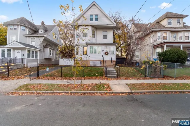 a front view of a building with street