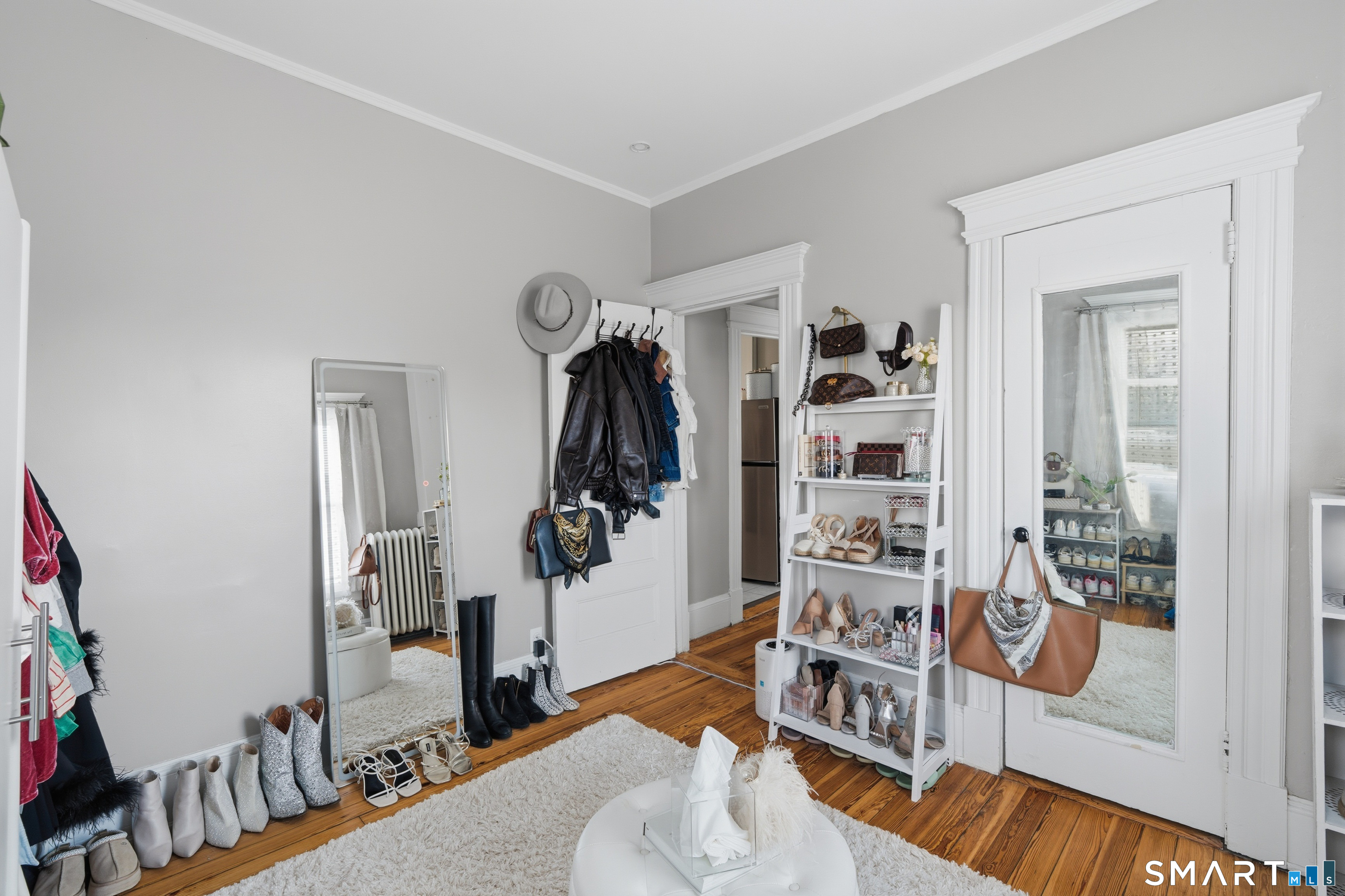 186 Arnoldale Road West Hartford, CT 06119 - Photo 14 of 22 a living room with furniture and a wooden floor
