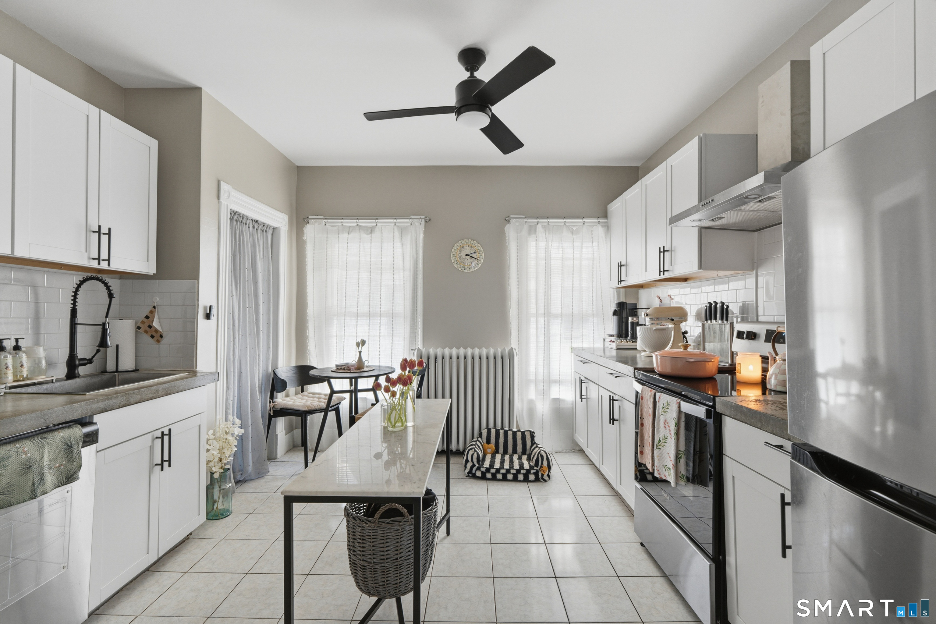 186 Arnoldale Road West Hartford, CT 06119 - Photo 15 of 22 a kitchen with stainless steel appliances kitchen island granite countertop a sink and cabinets
