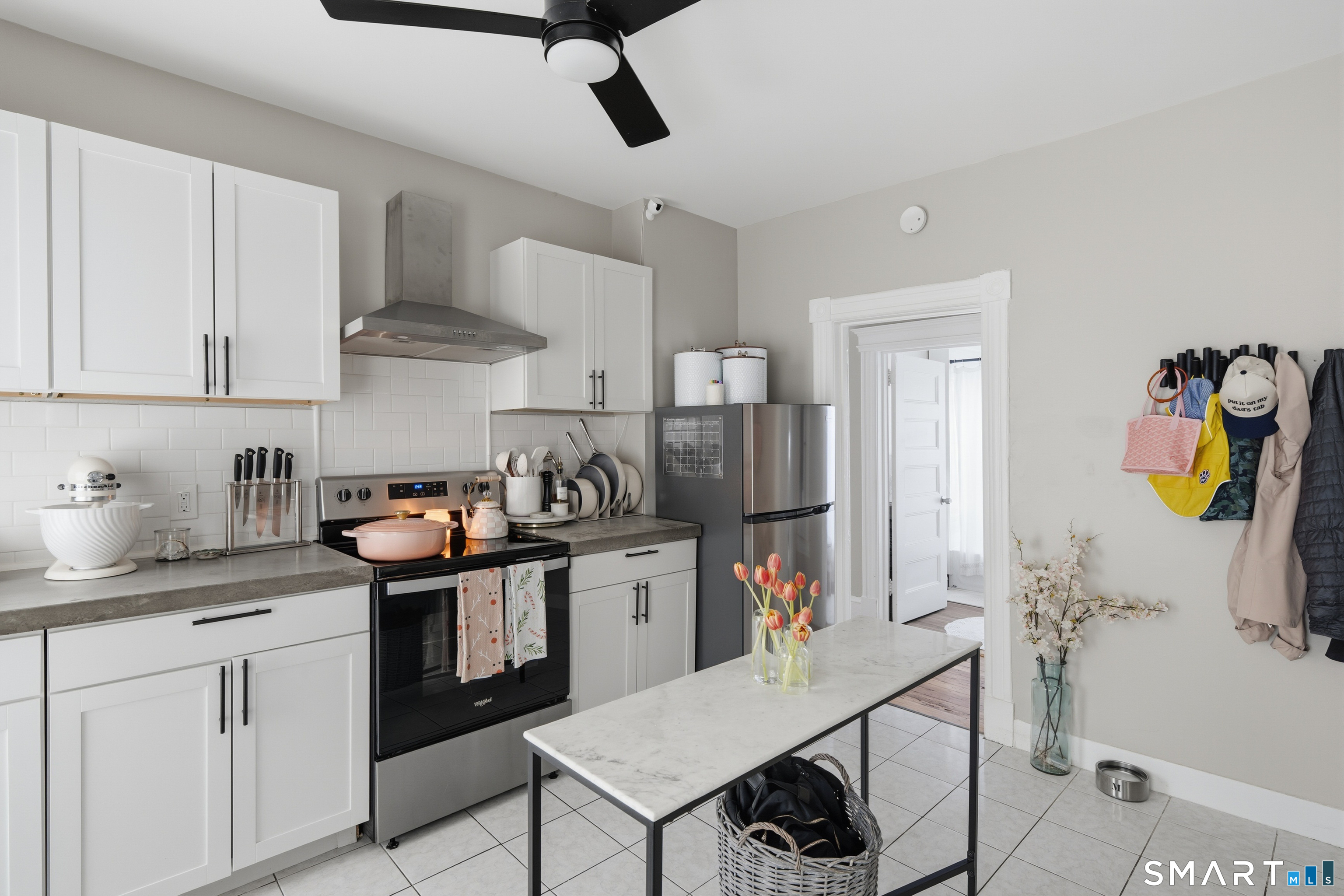 186 Arnoldale Road West Hartford, CT 06119 - Photo 19 of 22 a kitchen with stainless steel appliances granite countertop a sink a stove and a refrigerator