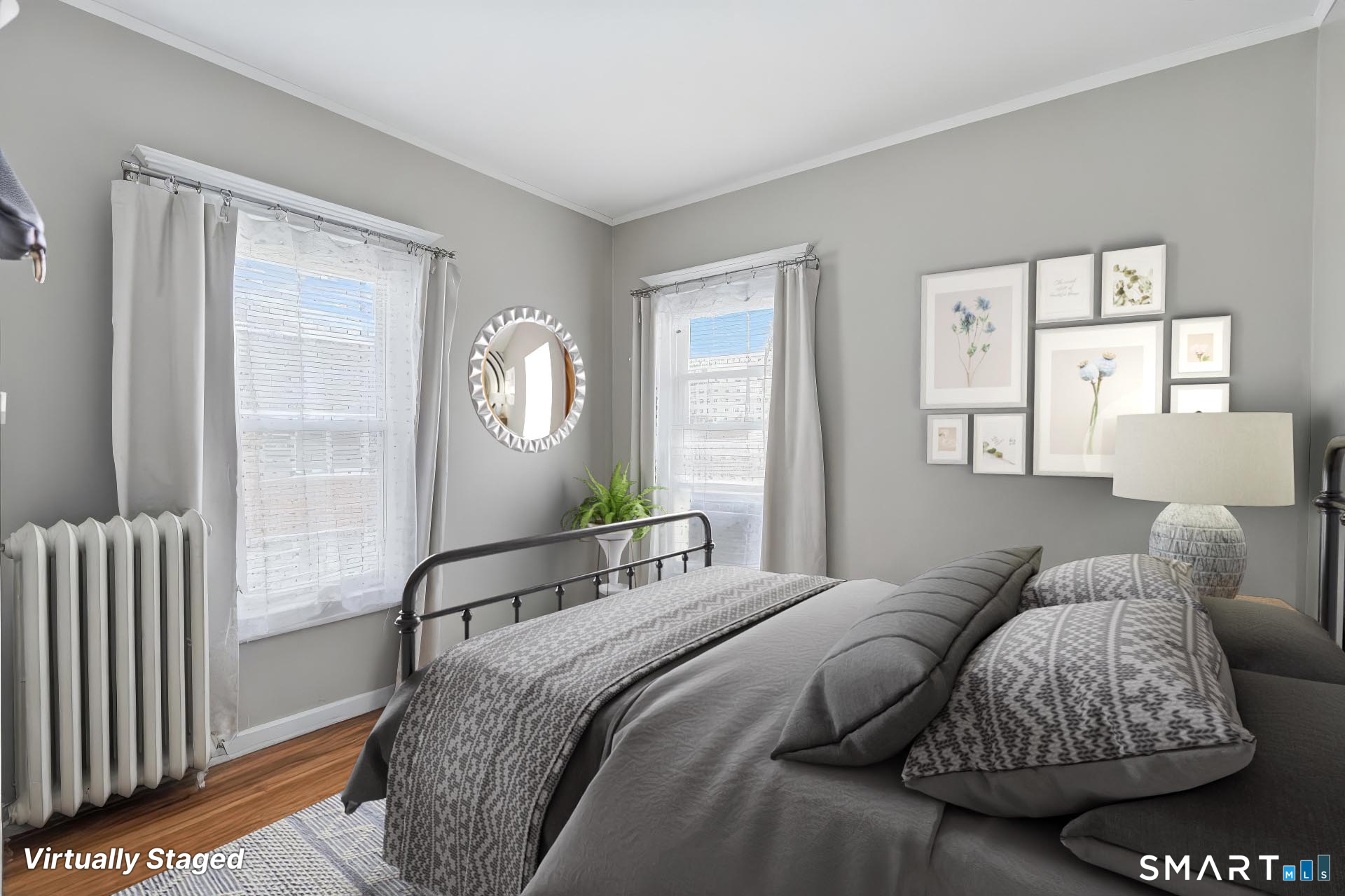 186 Arnoldale Road West Hartford, CT 06119 - Photo 22 of 22 a bedroom with a bed and dresser with mirror