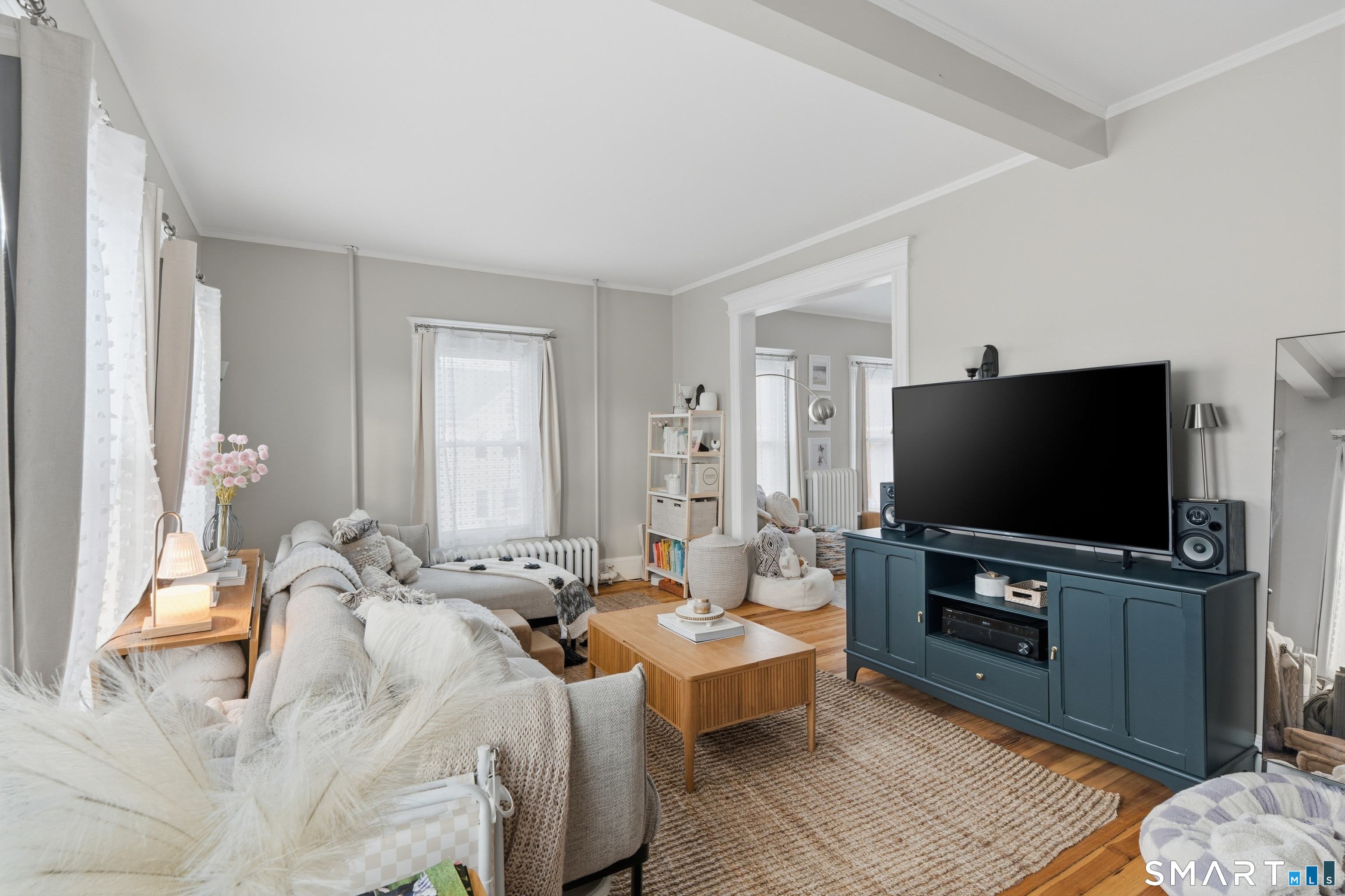 186 Arnoldale Road West Hartford, CT 06119 - Photo 3 of 22 a spacious bedroom with a bed and a flat screen tv