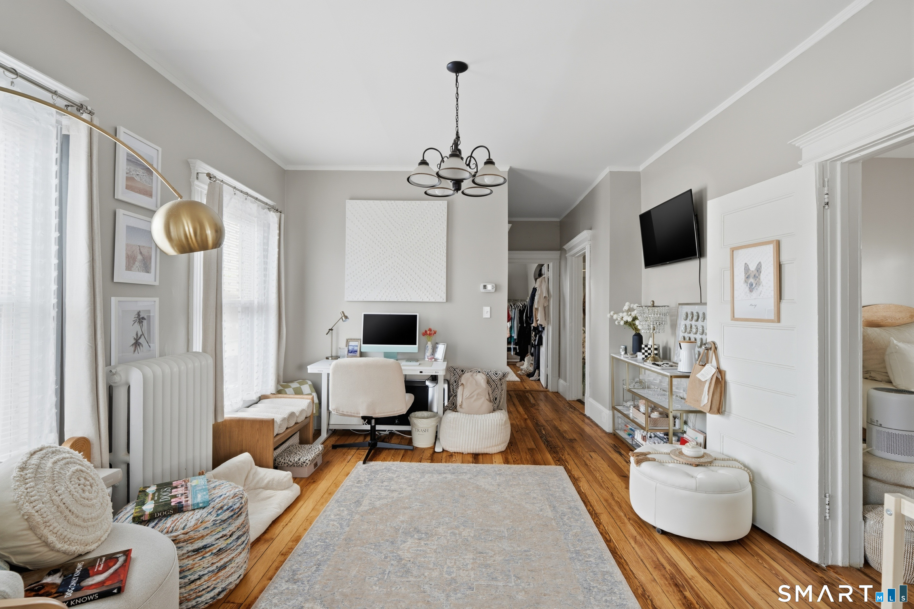 186 Arnoldale Road West Hartford, CT 06119 - Photo 5 of 22 a living room with furniture and a flat screen tv