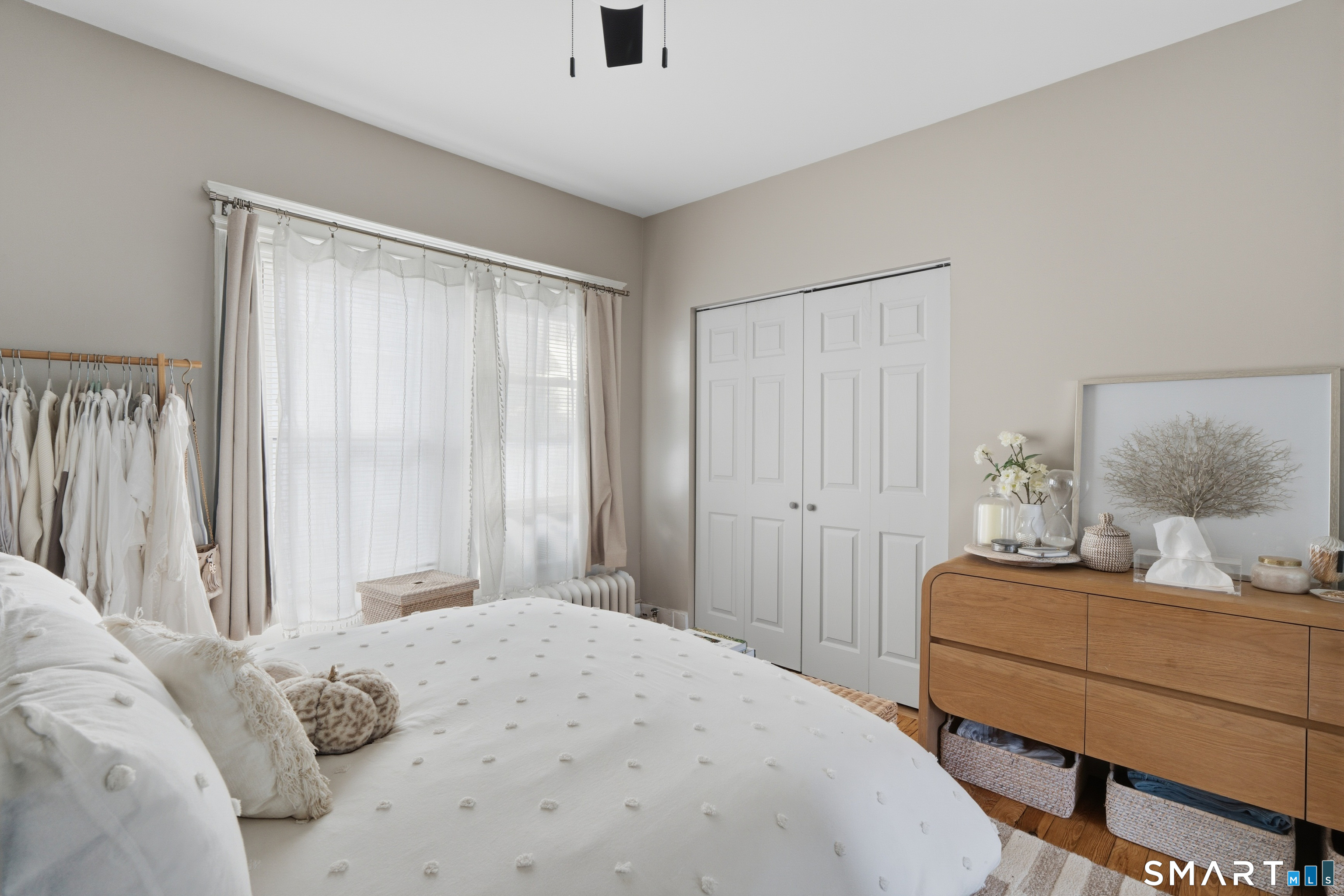 186 Arnoldale Road West Hartford, CT 06119 - Photo 9 of 22 a bedroom with a bed and a window