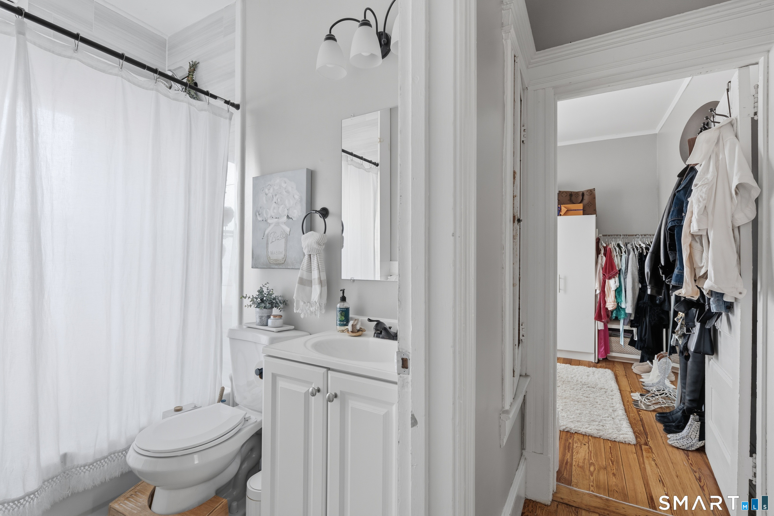 186 Arnoldale Road West Hartford, CT 06119 - Photo 10 of 22 a bathroom with a sink toilet and shower