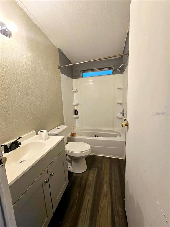 208 Pine Tree Trail Crescent City, FL 32112 - Photo 12 of 16 a bathroom with a sink and a mirror
