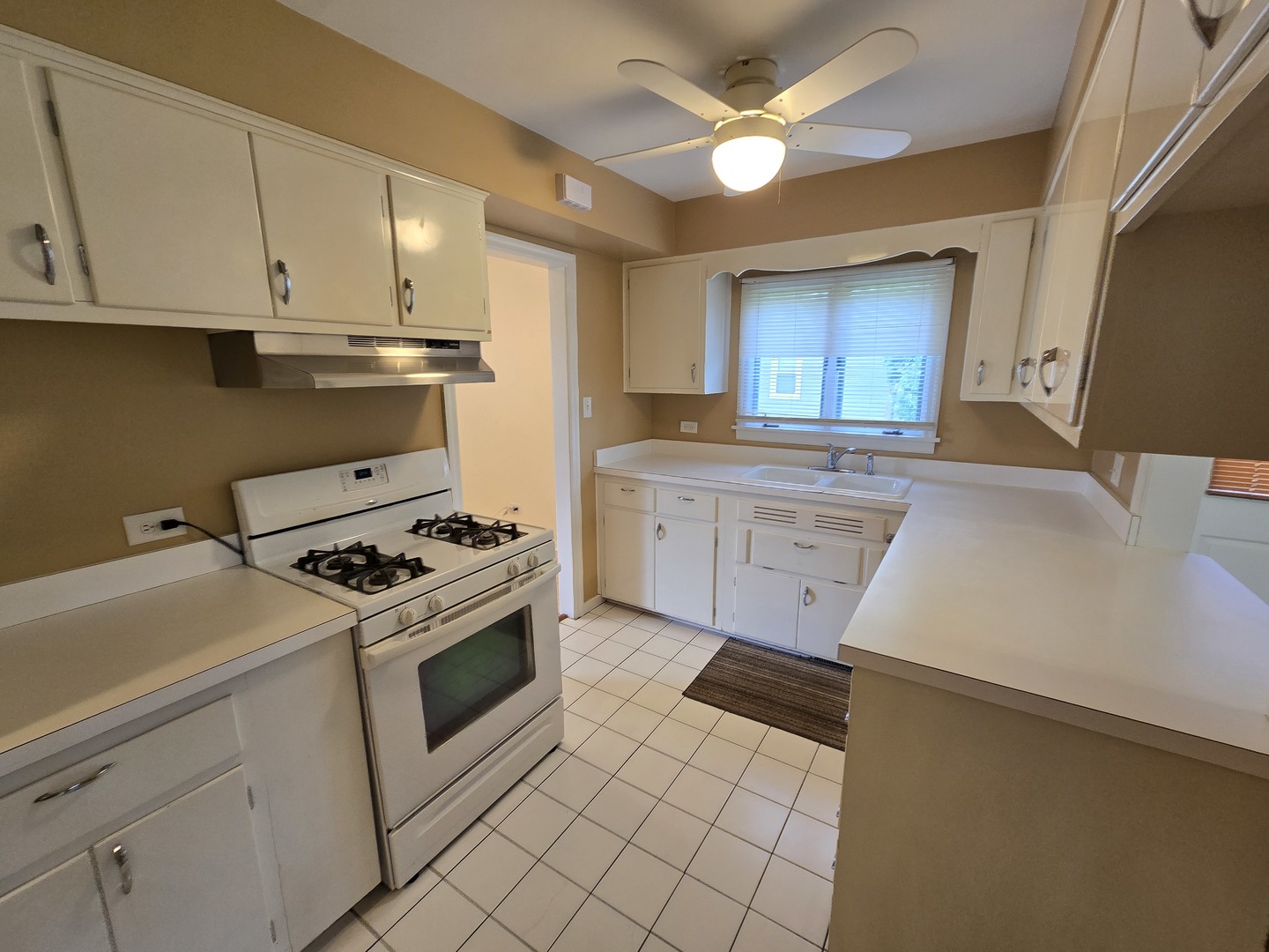 3620 Arthur Terrace Markham, IL 60428 - Photo 11 of 31 a kitchen with a stove sink and cabinets