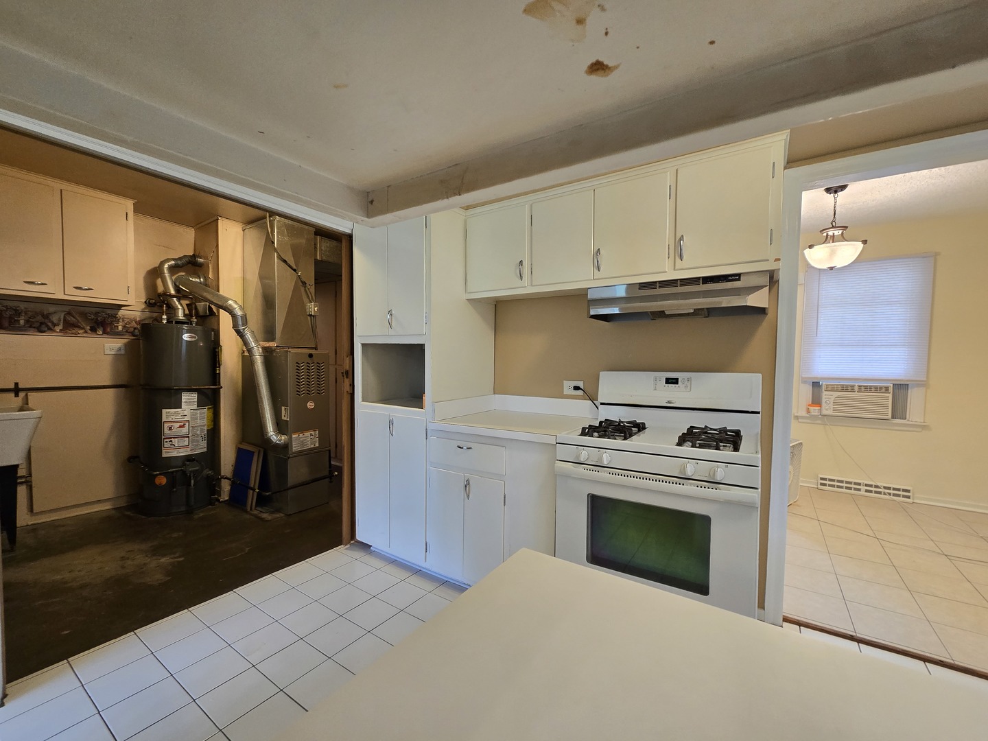 3620 Arthur Terrace Markham, IL 60428 - Photo 10 of 31 a kitchen with a stove a refrigerator and cabinets