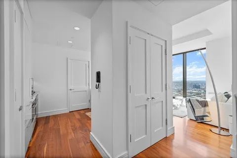 wooden floor with white walls