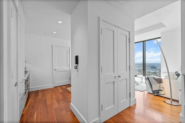 wooden floor with white walls
