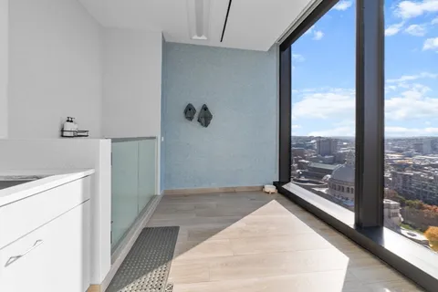 a view of a walk in closet and bedroom