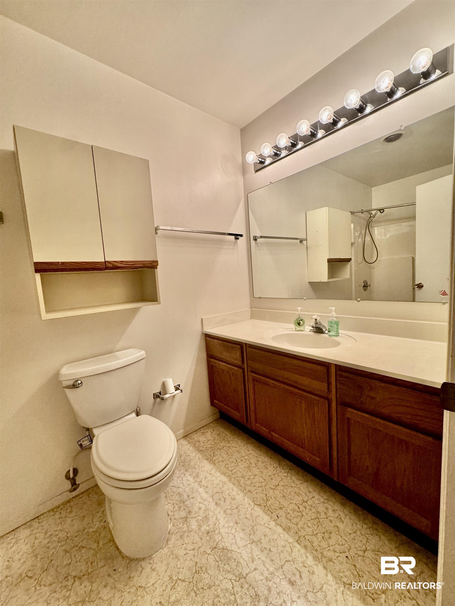 512 Deborah Court Foley, AL 36535 - Photo 20 of 23 Bathroom with walk in shower, vanity, and toilet