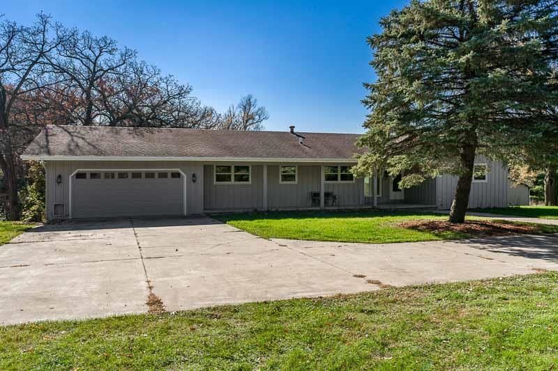 11371 Corrigan Road Roscoe, IL 61073 - Photo 1 of 85 a view of road with house in background