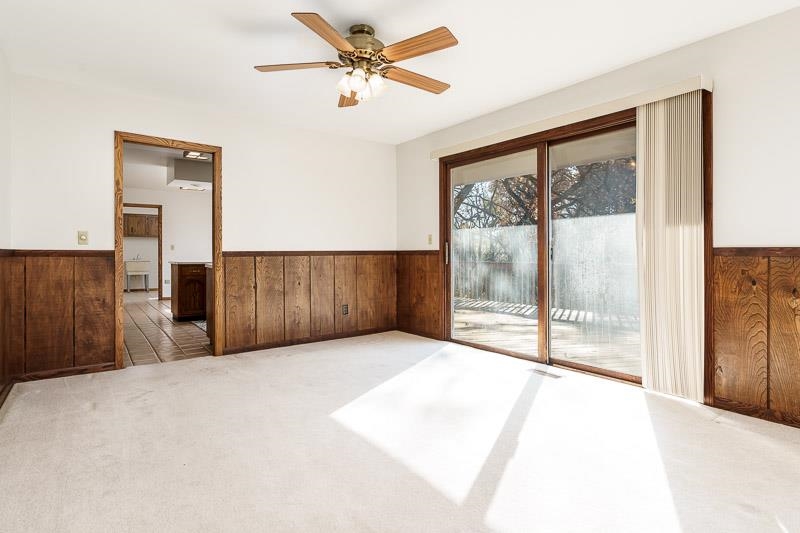 11371 Corrigan Road Roscoe, IL 61073 - Photo 15 of 85 a view of a bedroom with wooden floor and windows