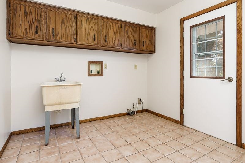 11371 Corrigan Road Roscoe, IL 61073 - Photo 24 of 85 a view of an empty room and wooden floor