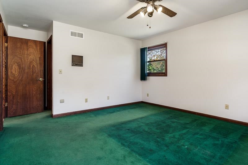11371 Corrigan Road Roscoe, IL 61073 - Photo 26 of 85 a view of an empty room with a window