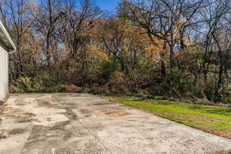 11371 Corrigan Road Roscoe, IL 61073 - Photo 58 of 85 a view of a yard with an trees