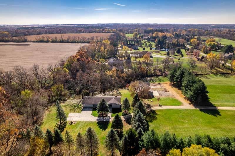 11371 Corrigan Road Roscoe, IL 61073 - Photo 79 of 85 an aerial view of residential houses with outdoor space and lake view