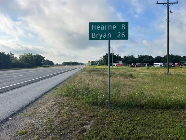 a sign that is on the side of a road