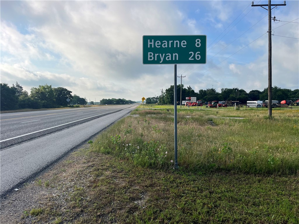 a sign that is on the side of a road