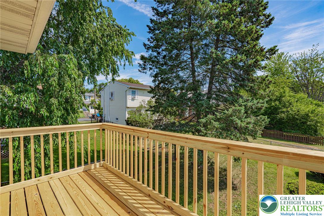 25 North 8th Street Emmaus, PA 18049 - Photo 39 of 51 A newly constructed wood deck provides an elevated outdoor retreat with scenic views of the surrounding landscape.