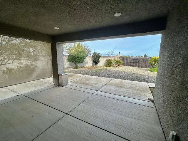 a view of a room with a large window