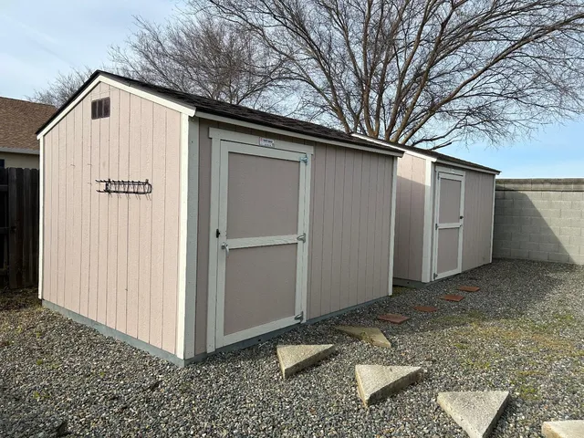 a view of backyard of house