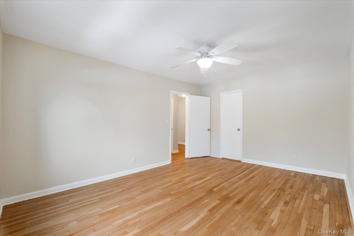 15 Chestnut Street, Unit 6A Rye, NY 10580 - Photo 12 of 27 a view of empty room with wooden floor