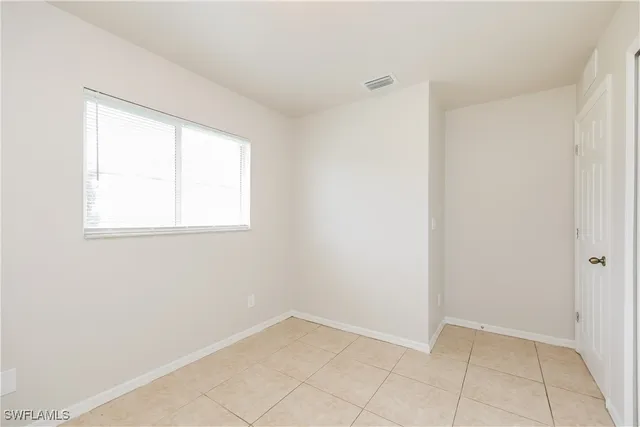 an empty room with a window