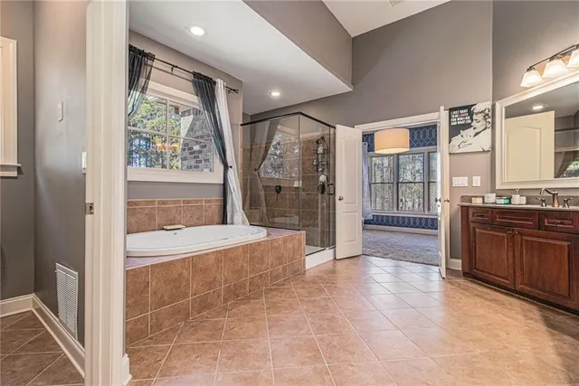 a bed room with a bed and a window