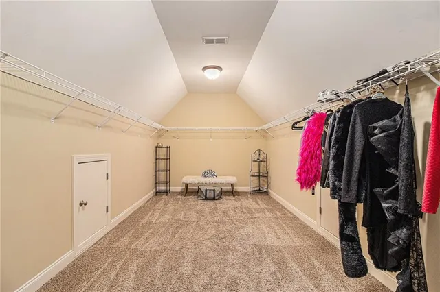 a en suite bathroom with a sink and mirror