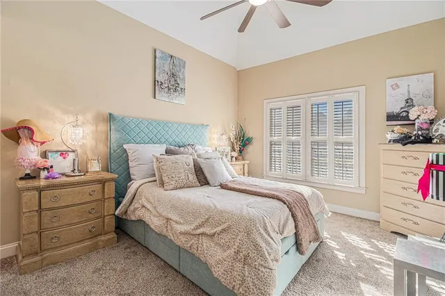 a bed room with furniture and a window