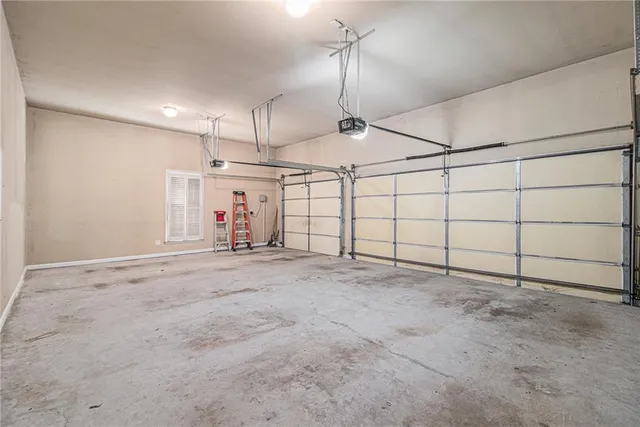 a view of a house with a snow in the background